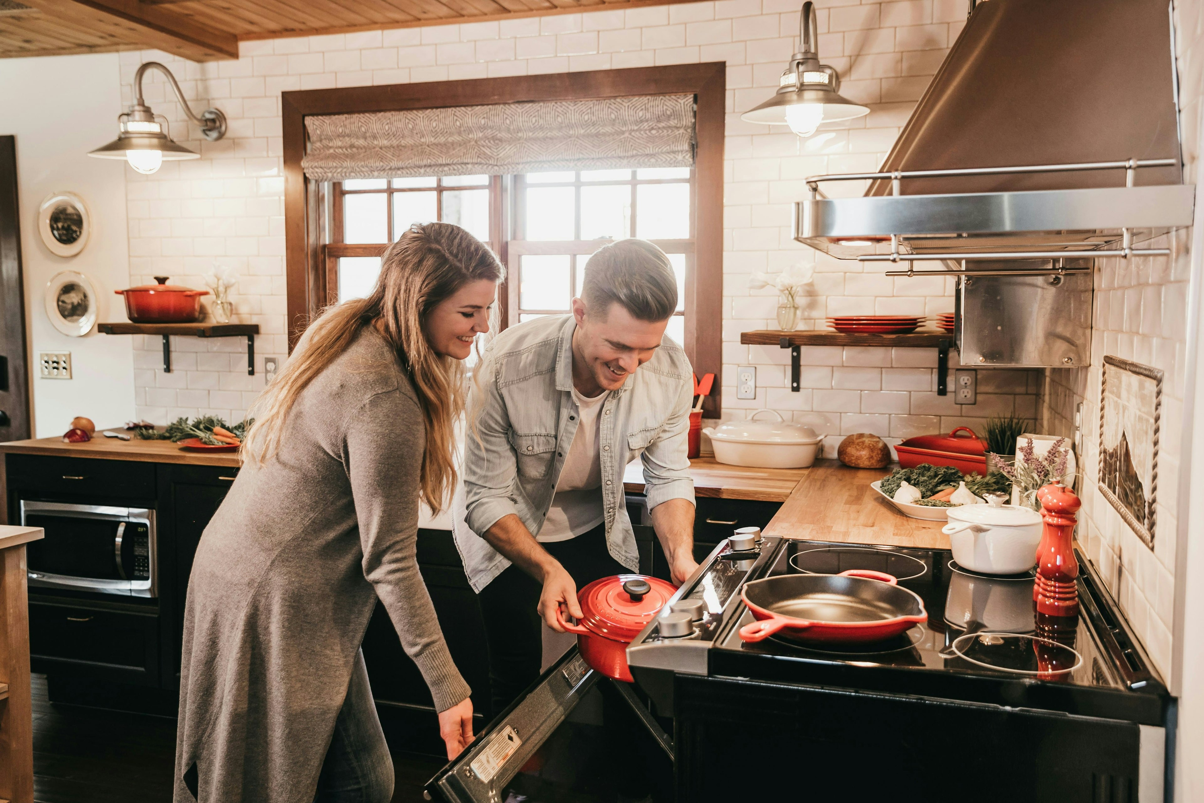 Image of a couple cooking in a kitchen
