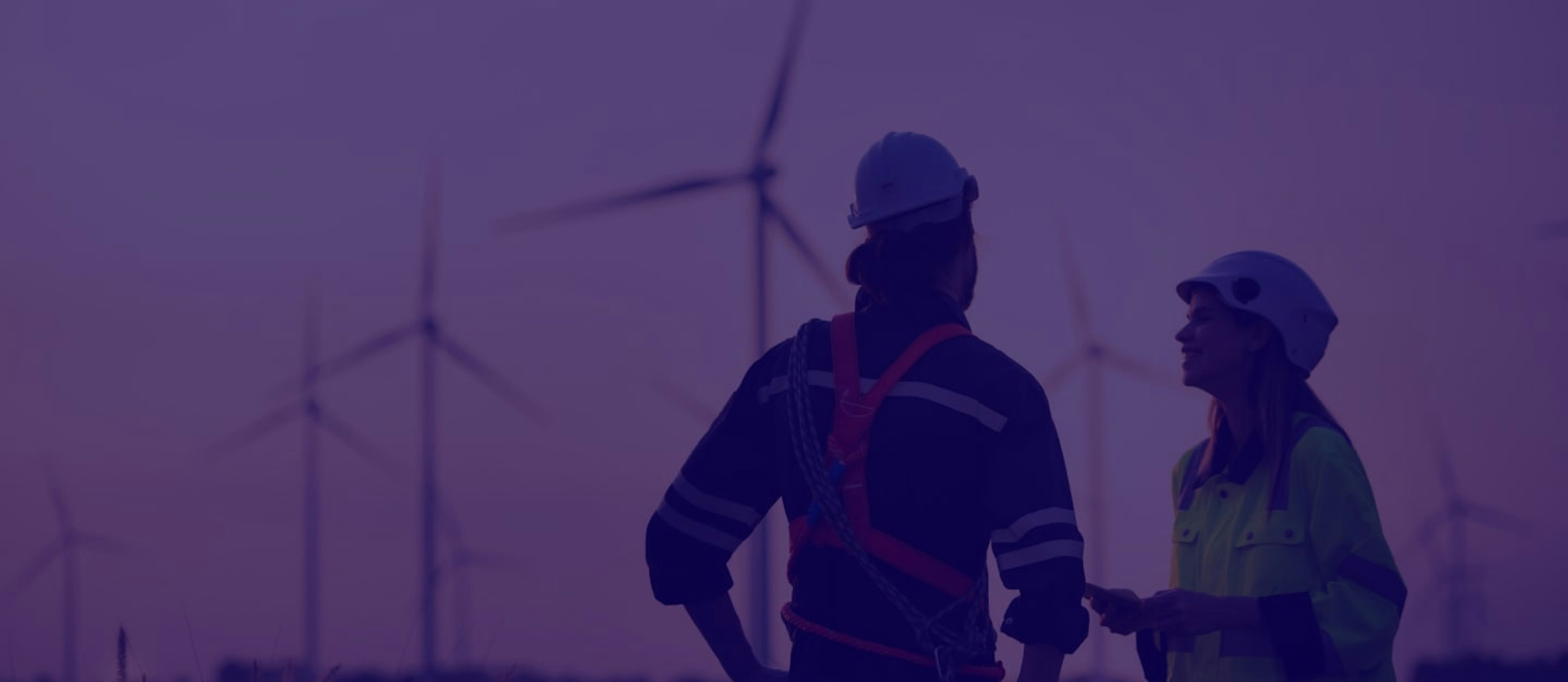 Image of workers on a wind farm