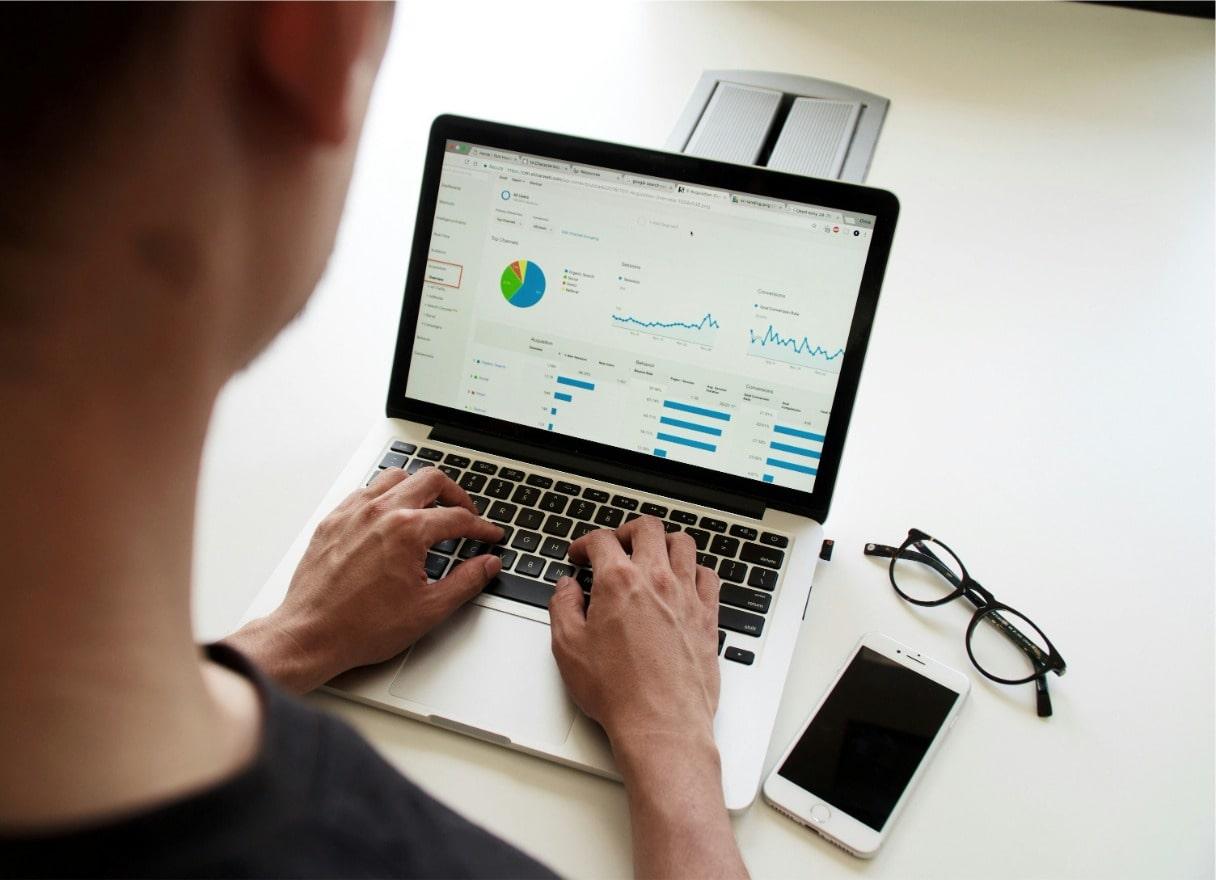 Image of a person looking at a computer