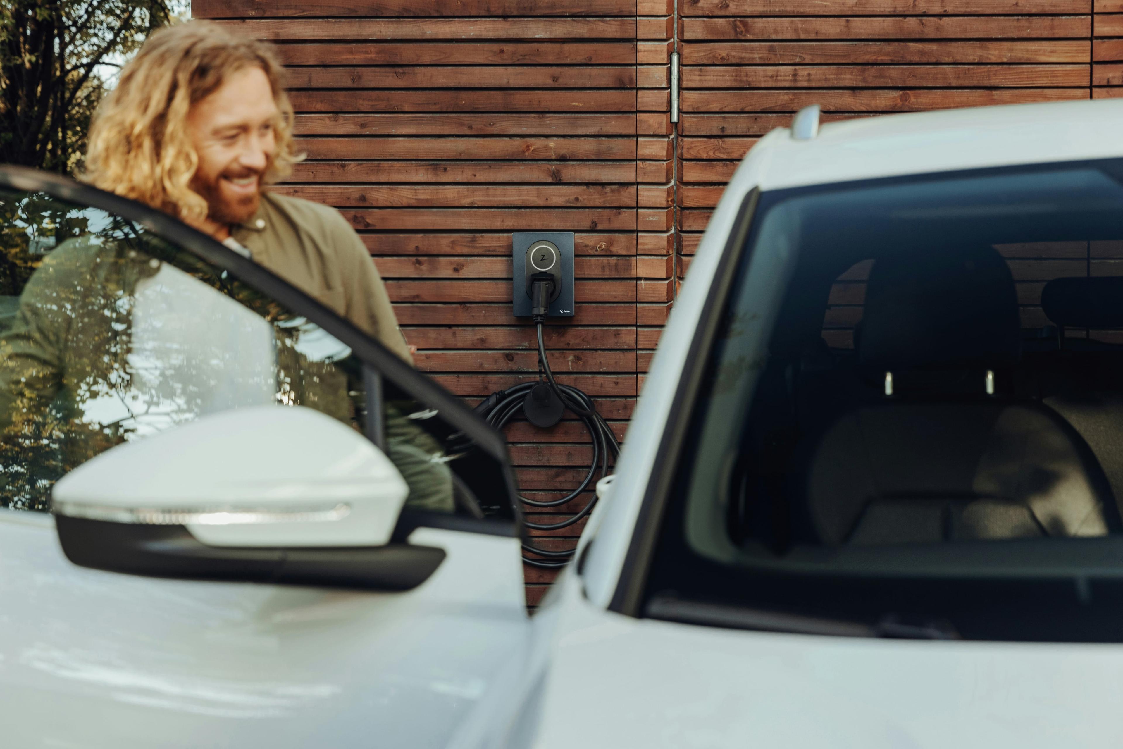 Image of a man entering an electric vehicle